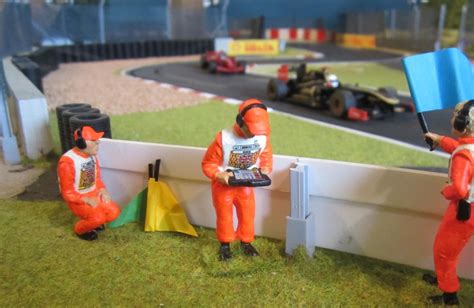 Slot car miniature figures for your race track .